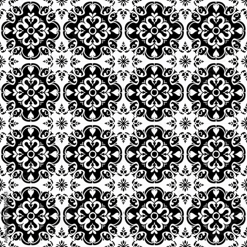 Seamless black and white ornamental pattern with intricate floral designs, perfect for decoration and tile designs