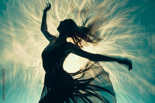 A dancer in a long flowing dress is captured in mid-twirl