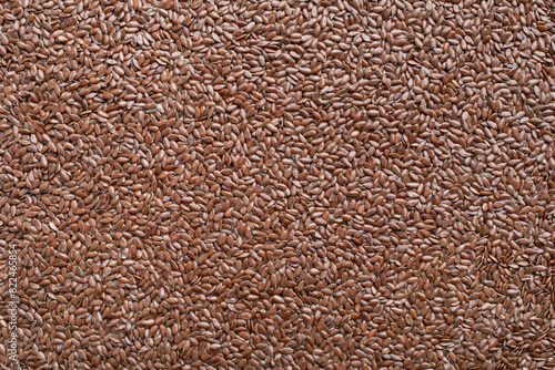 Organic linseed or flaxseed texture or surface as background.