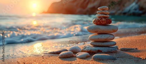 Stones balance the beach sand. meditation yoga background