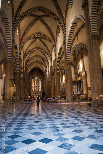 Nave with Gothic arches and Corinthian columns and altar of Santa Maria Novella church, Florence ITALY