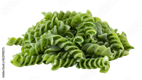 Uncooked fusilli spirulina pile, organic dry pasta isolated on a transparent background