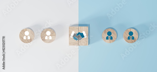 hand shaking icon on wooden cube blocks and human in circle icon for business deal concept. Teamwork process of partner, best relationship. For business contract,