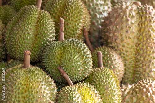 Durian fruit as background. Close-up