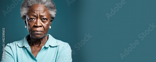 Cyan background sad black american independant powerful Woman realistic person portrait of older mid aged person beautiful bad mood expression Isolated on Background racism