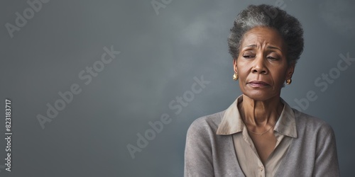 Cream background sad black american independant powerful Woman realistic person portrait of older mid aged person beautiful bad mood expression Isolated on Background racism 