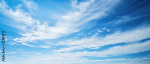 Expansive Blue Sky with Wispy Cirrus Clouds