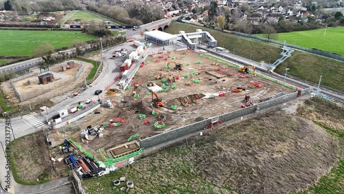 an aerial shot of a construction site and surrounding area of a city