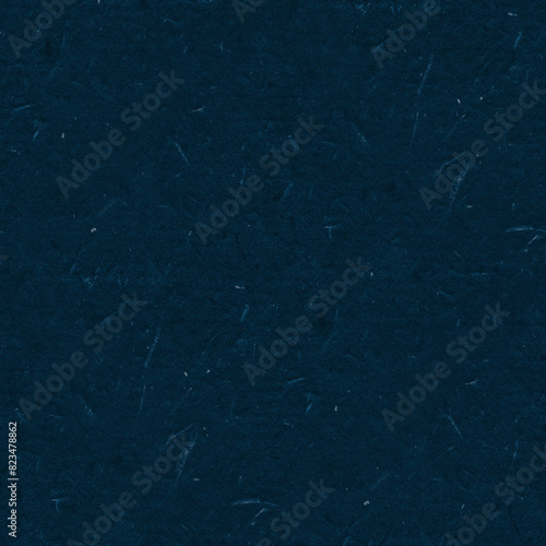 Japanese decorative paper in navy blue tones. Rough surface with many vegetable fibers. Best for collage, bookmaking, hobby, crafts, fine art. Seamless background.