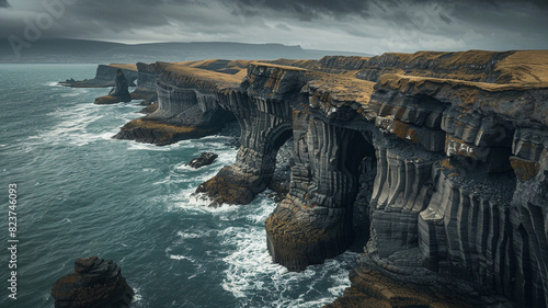 a rugged coastline with sea cliffs carved into fantastical shapes by centuries of erosion