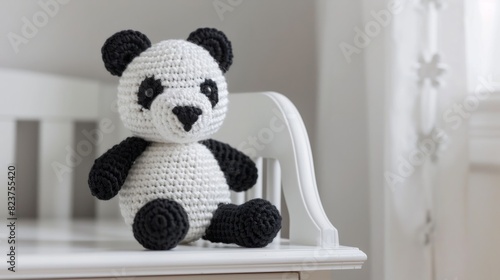 Handmade crochet teddy bear doll, on dresser in baby room generative ai