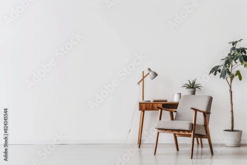 Minimalist room with midcentury modern furniture and decor, including an armchair on the right side of the frame