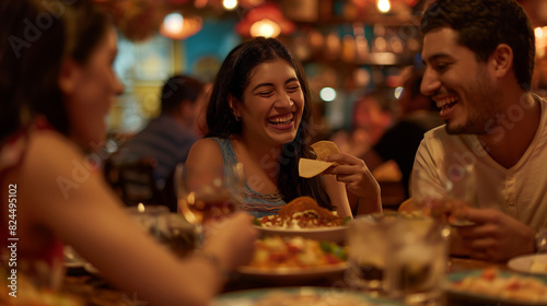 A group of friends immersed in the flavors of Mexican cuisine at a bustling restaurant, their happy faces and animated conversation creating a lively atmosphere, the background blurred