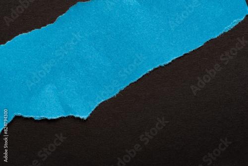 破れた青と黒の紙の背景