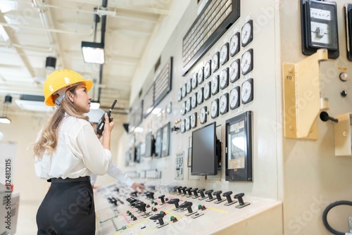 Amid the ever-changing landscape of the industrial sector This power plant is a sign of progress. There was an Asian female engineer working in front of the electronic circuit switches.