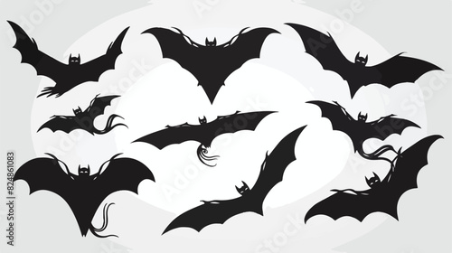 Flying bats black silhouettes. Spooky halloween symbo