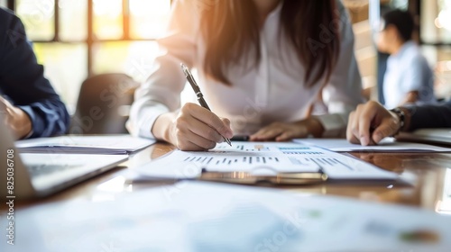 Financial advisor discussing plans with clients, office environment, detailed consultation, financial guidance, professional and trustworthy, future planning, copy space.