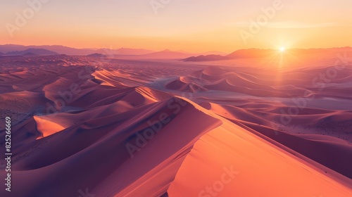 A serene desert landscape at sunrise with rolling sand dunes and a warm golden glow, capturing the natural beauty and tranquility of the scene.