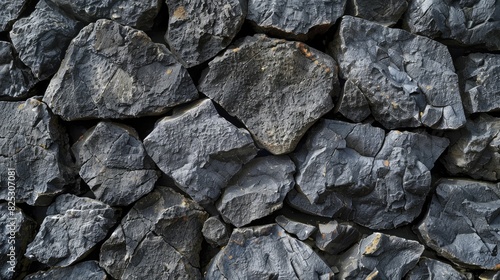 Rough basalt stones, closeup with natural textures, outdoor lighting