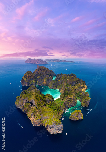 Aerial top view sunset Maya Bay in island Phi Phi Leh, turquoise clear water in Krabi Thailand. Amazing travel photo by drone