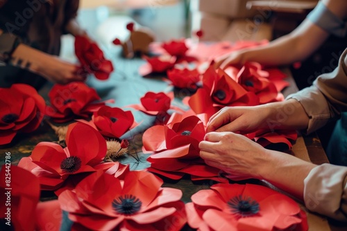 A workshop scene with people of various ages making paper poppies, emphasizing community involvement and craft skills. Memorial day, National Poppy Day