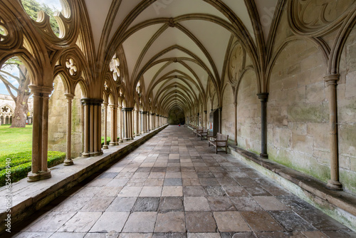 Arched walkway in the Cloister Garth of the medieval Salisbury Cathedral, in Salisbury, England, UK.