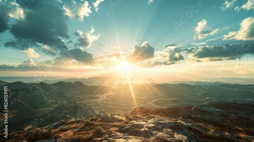 Sun rays beating down on an arid landscape, creating a shimmering effect on the horizon.