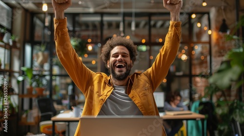 Energized Leader Motivating Team on Table in Victory Cheer