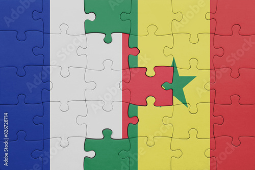 puzzle with the colourful national flag of senegal and flag of france.