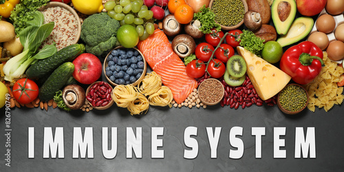 Immune system boosting with proper nutrition. Different foods on black table, flat lay. Banner design