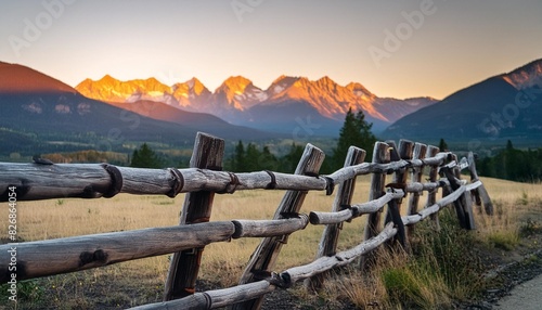 october 3 2018 ridgway colorado usa sunrise on worm western fence in front of san juan mountains in old west of southwest colorado near ridgway