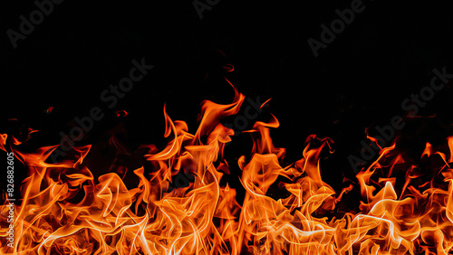 Fiery Flames on Black Background: Intense Heat and Energy