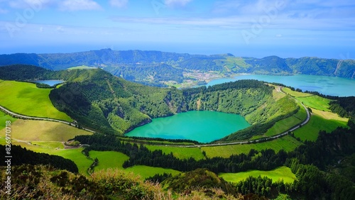 kes in a volcanic crater, green meadows and forests, fantastic natural scenery. The Azores.