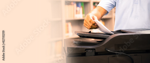 Hand use photocopy or copier or photocopier office equipment workplace for scanner or scanning document or printer for printing paper hard copy duplicate Xerox or service maintenance concepts.
