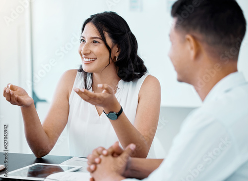 Business woman, meeting or discussion in office with colleagues for collaboration, communication and teamwork. Female person, listening or conversation with coworkers for planning and brainstorming