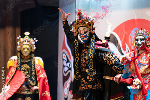 CHENGDU, CHINA - MAY 10, 2024 -Chinese actor performs a public traditional changing face performance onstage in Chengdu, China