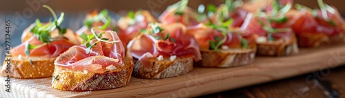 Prosciutto and fig crostini with goat cheese and microgreens on rustic bread