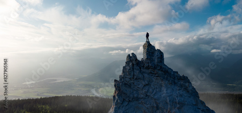Adventurous Man Standing on top of Mountain Cliff. Extreme Adventure Composite. 3d Rendering Peak.