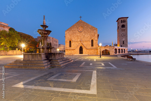 Evangelismos Church and historic fountain in Rhodes, Greece, illuminated at twilight