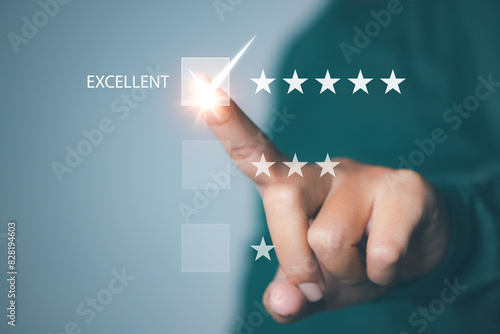 Businessman touching giving high score for feedback review satisfaction service. Customer satisfaction experience with five star icon and excellent for feedback review satisfaction service.