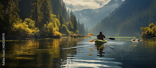 Man rowing with kayak on river