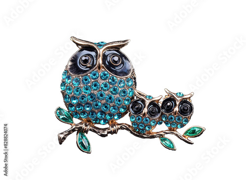 This brooch features an adorable owl family adorned with sparkling crystals