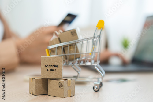 internet shopping e commerce concept, Parcel boxes of product on laptop computer related buy from online store.