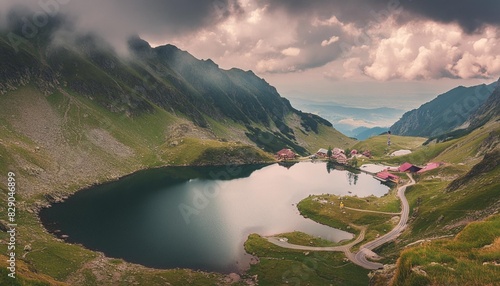 capra lake of fagaras range on a cloudy day summer nature scenery in mountains of romania popular travel destination of transylvania alps