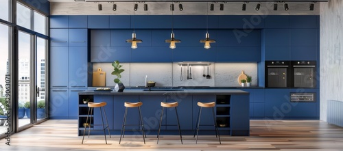 Modern blue kitchen with cobalt blue cabinetry, light wood floors, and industrial light fixtures
