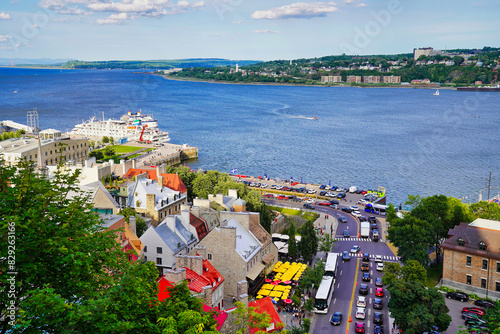 Magnificent Wide angle panorama view from the top of the Dufferin terrace of St. Lawrence river with cruise ships and the town of Levis on the opposite shore in Quebec city, Canada