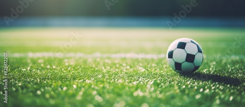 Selective focus on a white line in the artificial soccer field with copy space image