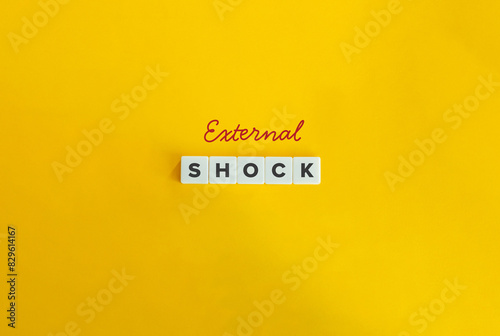 External Shock Term. Abrupt Changes In Economic Conditions. Text on Letter Tiles on Yellow Background. Minimalist Aesthetics.