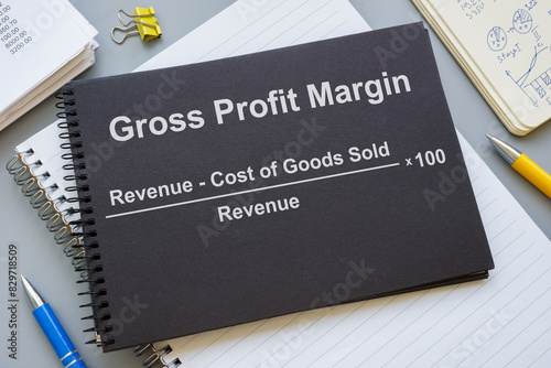 Notepad with Gross Profit margin gpm formula.