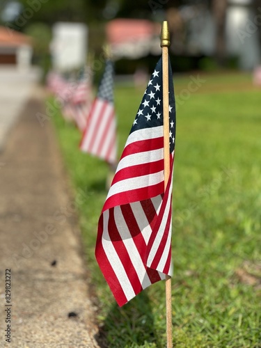 Selective focus of the American flag on street